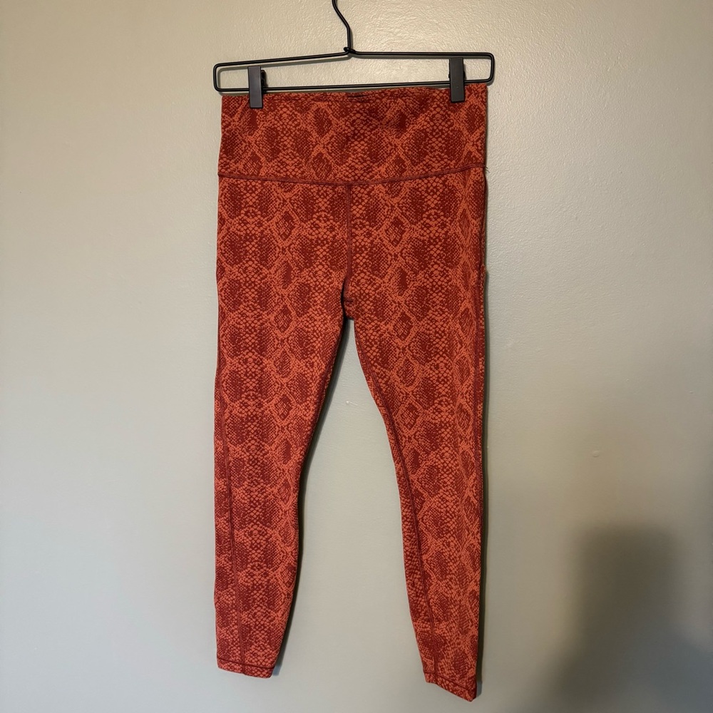 Athleta Ultimate 7/8 Tight in Rust Animal Print size S